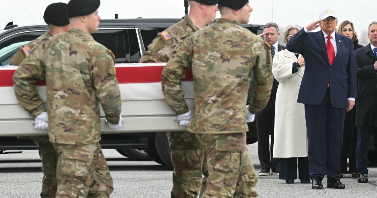 President Trump salutes during dignified transfer at Dover AFB
