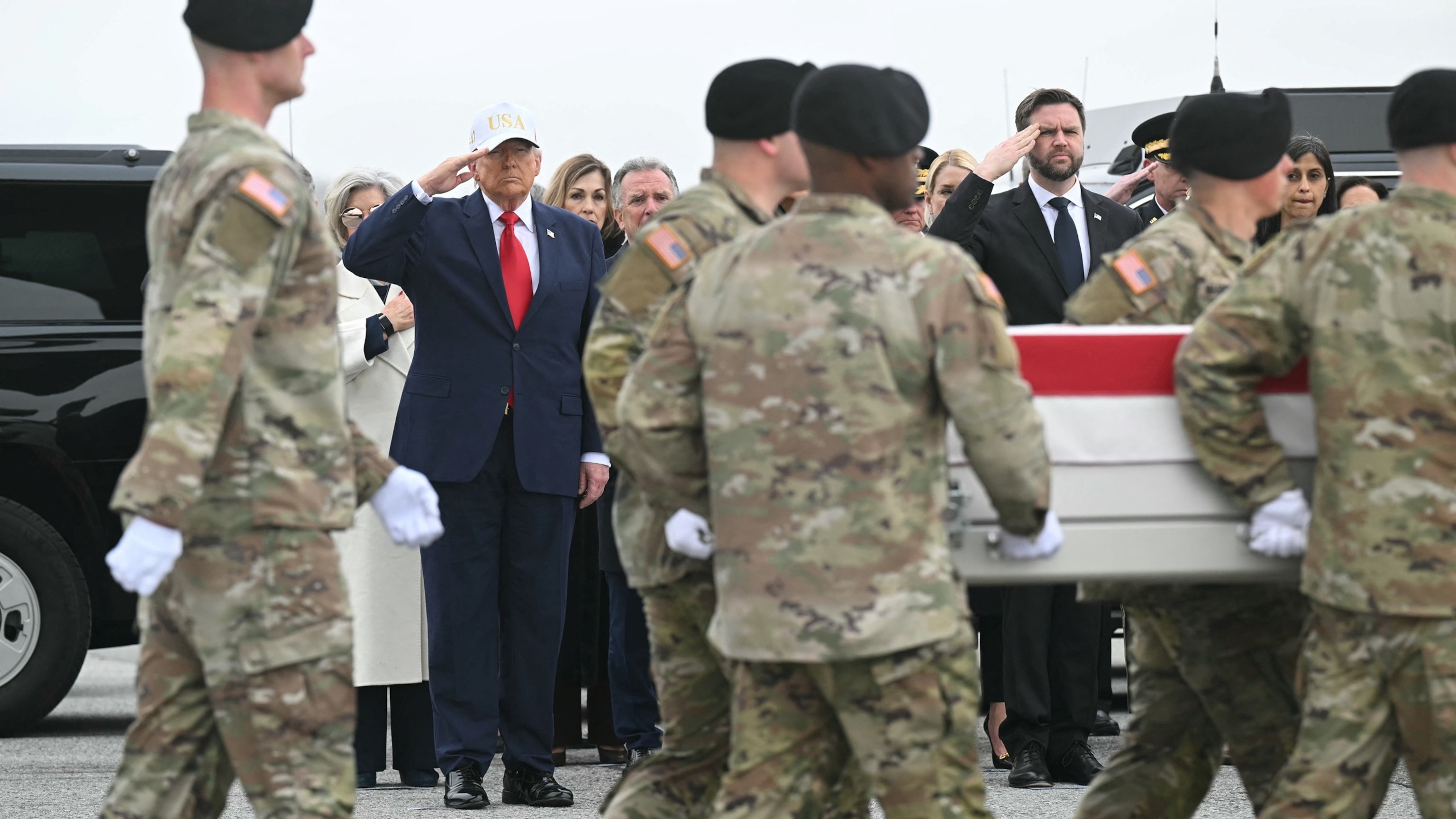 Dignified transfer ceremony — Trump and military honor guard