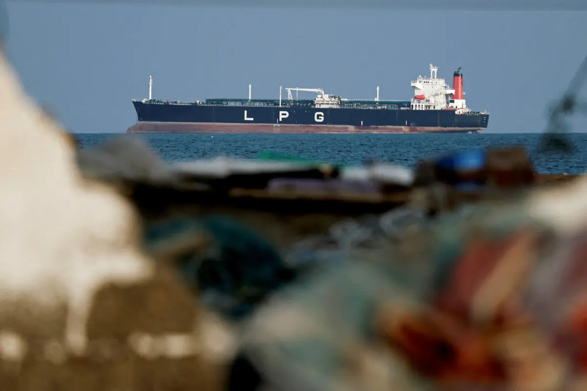 LPG tanker transiting the Strait of Hormuz — Iran threatens full closure as war enters Day 17; global energy markets on alert