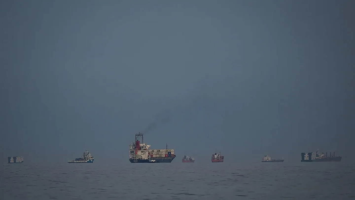 Tanker traffic in the Strait of Hormuz drops to near-zero after Day 24 energy infrastructure strikes — global shipping insurance rates surge 1,200%