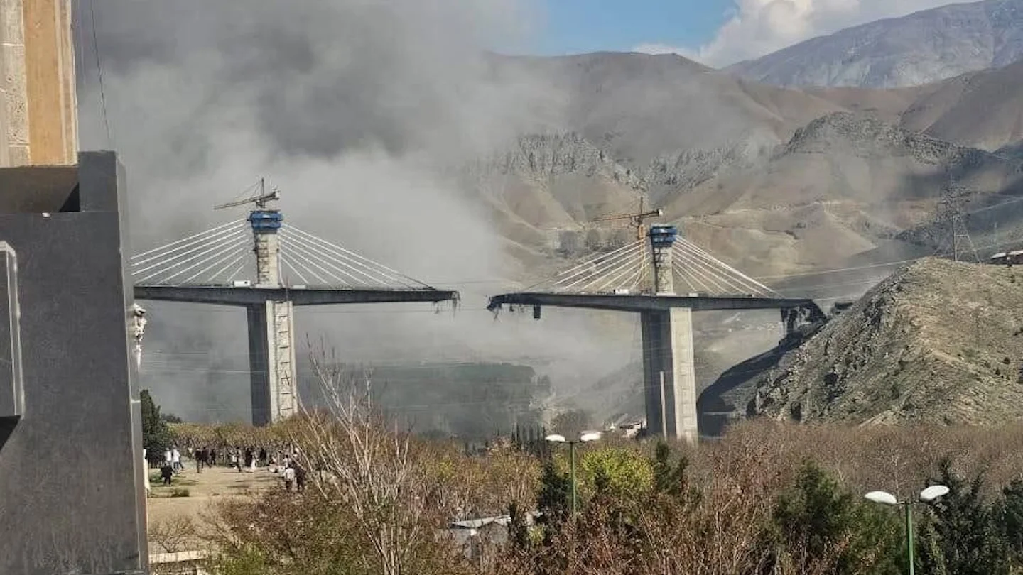 Tehran–Karaj B1 bridge after GBU-57 strike — 240m span collapsed; first US strike on civilian transport infrastructure; 8 killed including 4 IRGC convoy soldiers