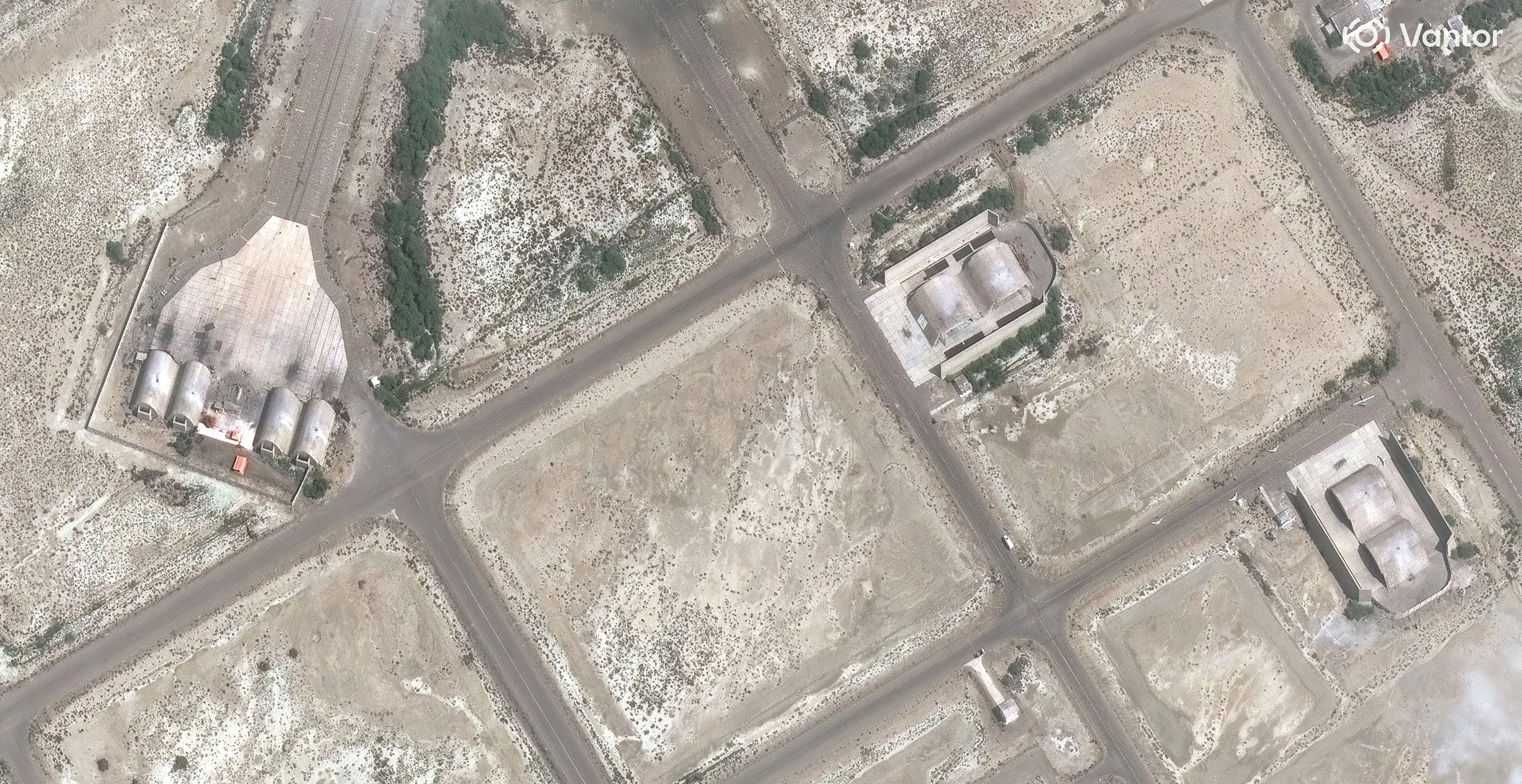 Satellite overview — multiple Iranian airbase shelter complexes destroyed; Iranian Air Force operationally grounded after Day 25