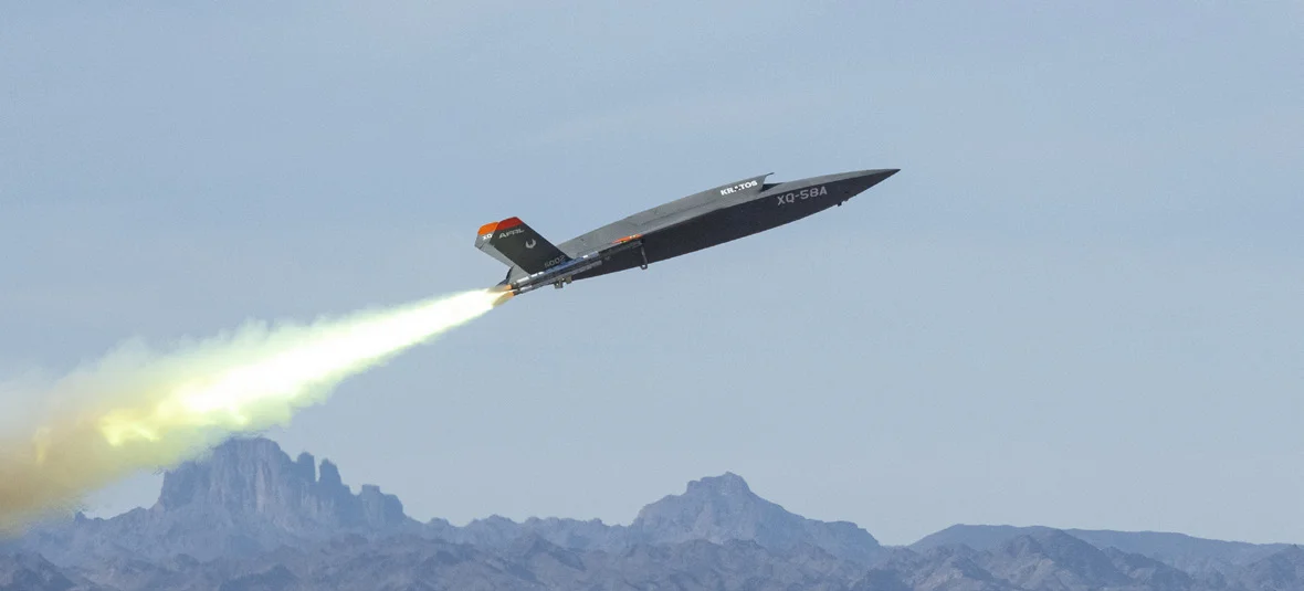 XQ-58A in formation flight — April 7 swarm of 400+ Valkyries and ALTIUS-600M simultaneously engages 85 dispersed IRGC targets across 12 provinces