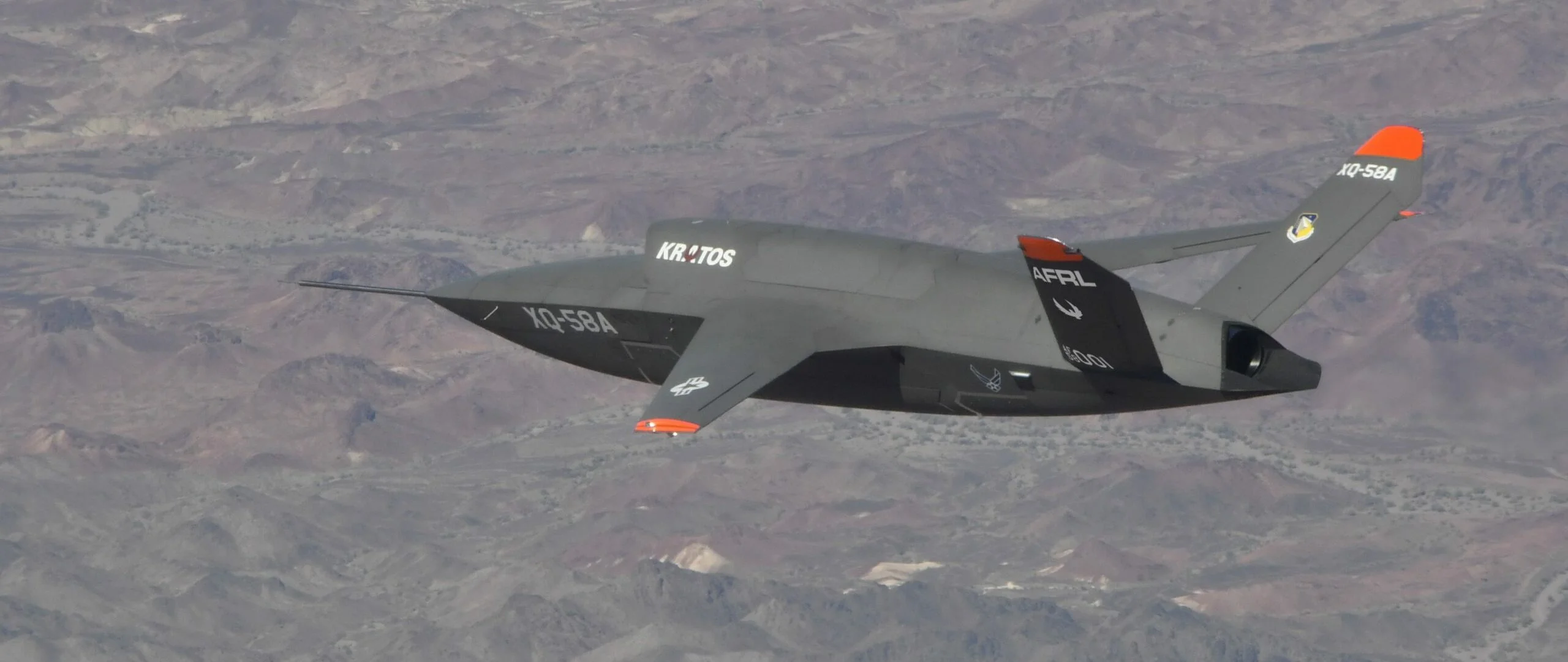 XQ-58A Valkyrie loyal wingman drone — first large-scale combat deployment; 300+ units launched from B-21 Raider internal bays over the Caspian Sea on April 7